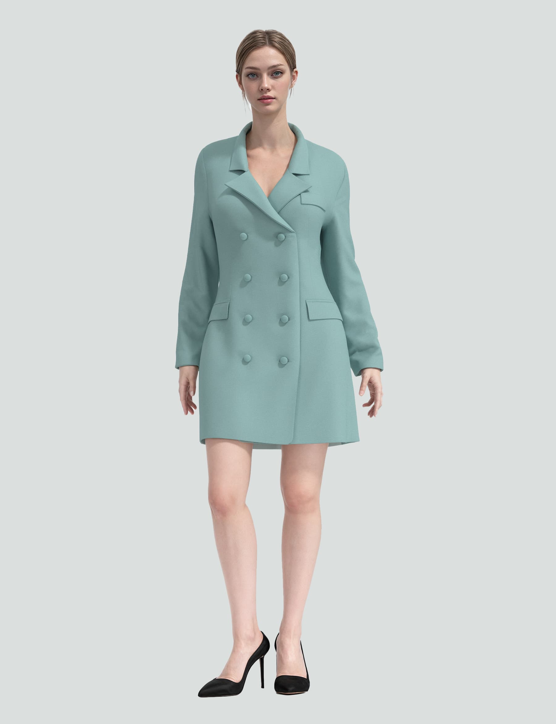 Model wearing the Shadows of Me sea green mini tuxedo dress with double buttons and a relaxed fit, styled with black heels.