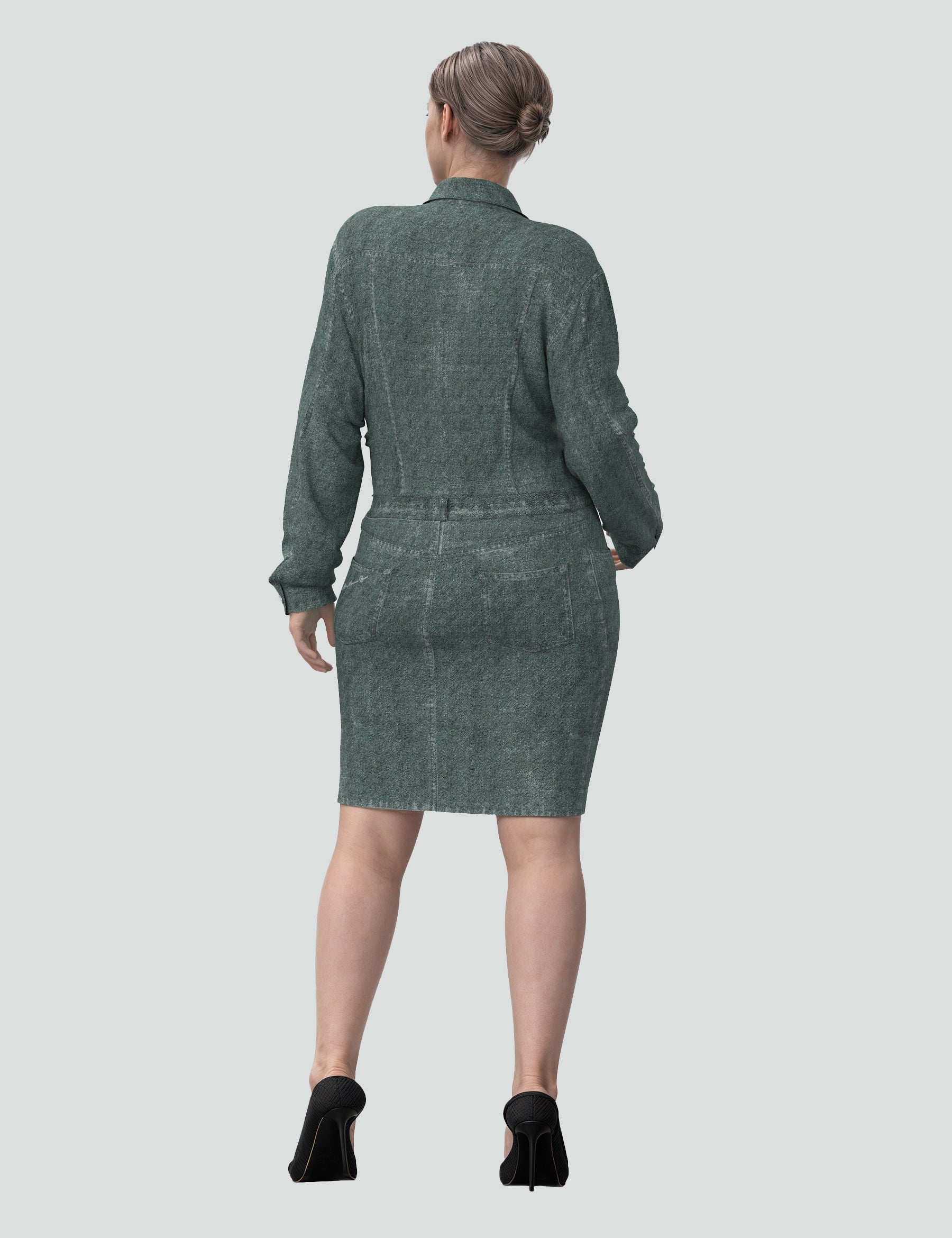 Back view of The Huntress green denim mini dress showcasing modern style and signature activewear fabric.